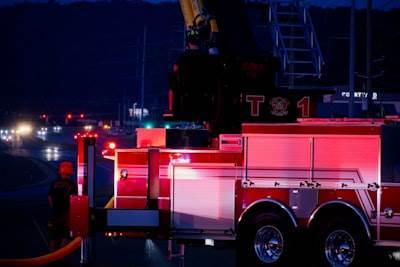 Cross-Modal Knowledge Distillation for Real-Time Policy-Constrained Forest Fire Evacuation Logistics Networks